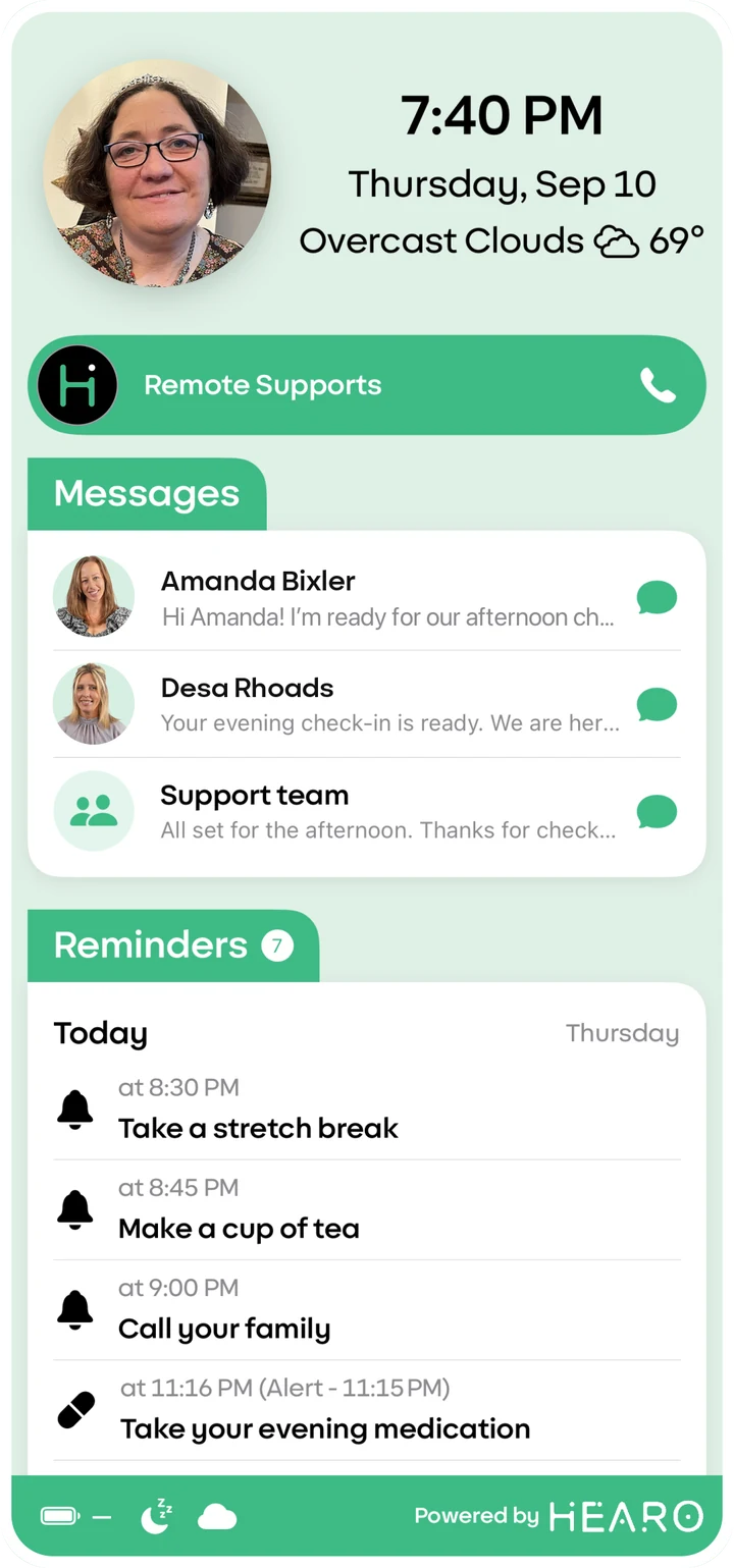 Hearo One on iPhone: Kathy's photo, the time and weather, a call button for Remote Supports, and messages from Amanda and Desa of the support team